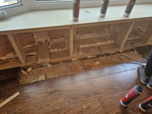 Interior wall and sill area prepared during window installation (interior view)