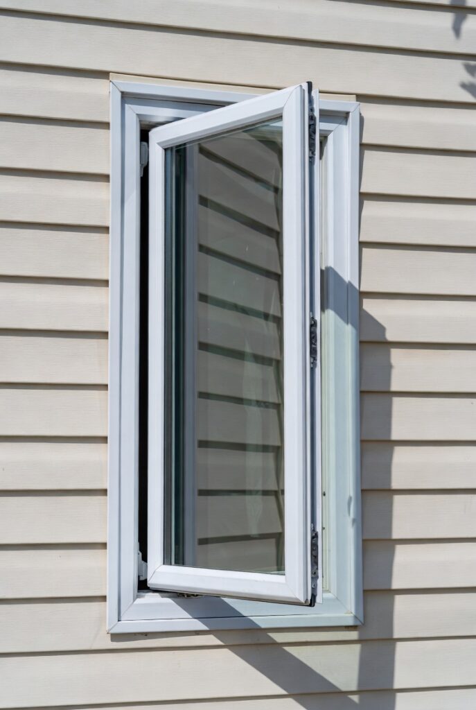 Casement window open outward on side hinges for ventilation.