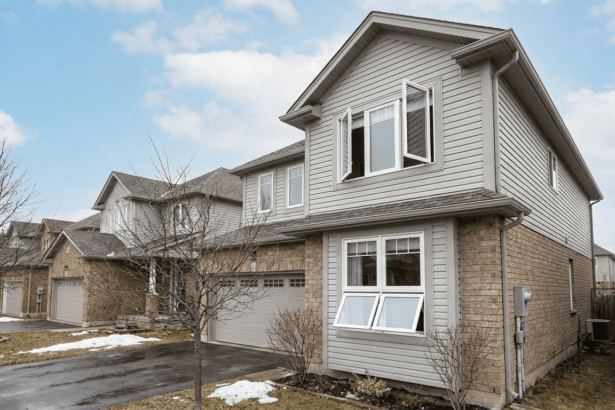 Barrie home exterior showing a casement window and a double-hung window.
